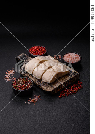 White fish fillets, seafood cooked with salt and spices. Fish fillets 129993861