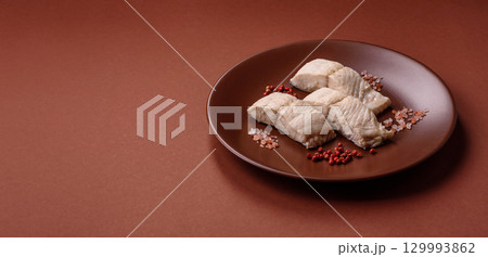 White fish fillets, seafood cooked with salt and spices. Fish fillets 129993862