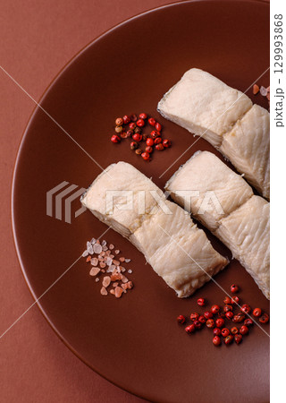White fish fillets, seafood cooked with salt and spices. Fish fillets 129993868