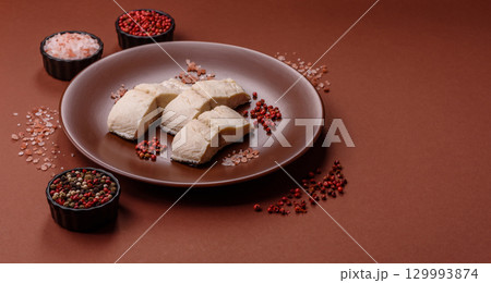 White fish fillets, seafood cooked with salt and spices. Fish fillets White fish fillets, seafood cooked with salt and spices. Fish fillets 129993874