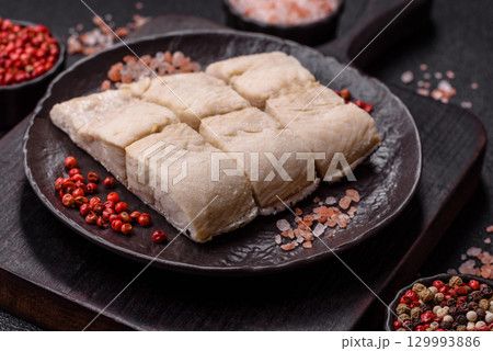 White fish fillets, seafood cooked with salt and spices. Fish fillets White fish fillets, seafood cooked with salt and spices. Fish fillets 129993886
