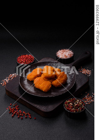 Chicken nuggets in breading, takeaway food, junk food 129993908