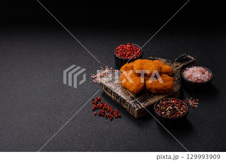 Chicken nuggets in breading, takeaway food, junk food Chicken nuggets in breading, takeaway food, junk food 129993909