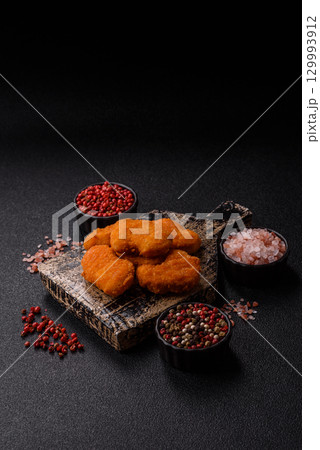 Chicken nuggets in breading, takeaway food, junk food 129993912