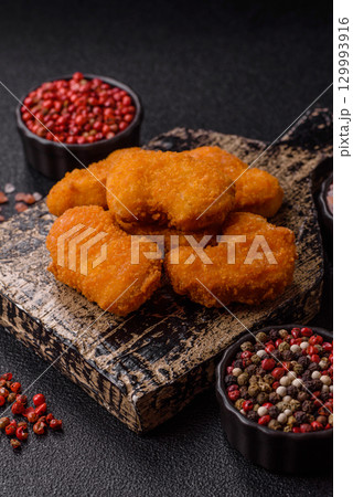 Chicken nuggets in breading, takeaway food, junk food 129993916