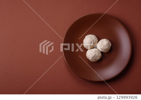 Chicken meatballs, cutlets steamed with salt and spices, a healthy meal 129993926