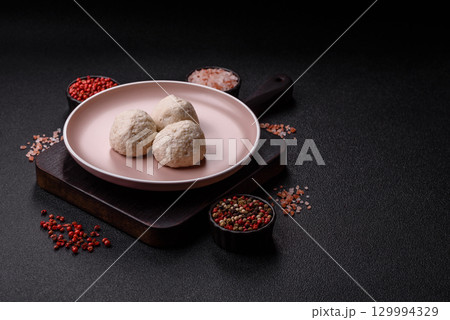 Chicken meatballs, cutlets steamed with salt and spices, a healthy meal 129994329