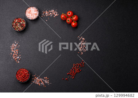 Ingredients for cooking cherry tomatoes, salt, spices and herbs Ingredients for cooking cherry tomatoes, salt, spices and herbs 129994682