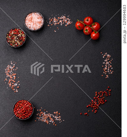 Ingredients for cooking cherry tomatoes, salt, spices and herbs 129994683