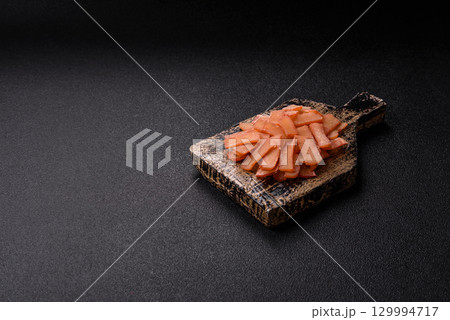 Food, dried squid in shavings or chopped as snacks or jerky. Snack dried squid for beer Food, dried squid in shavings or chopped as snacks or jerky. Snack dried squid for beer 129994717