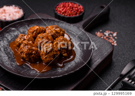 Meat, meatballs in tomato sauce, Italian food, beef or pork with salt . Meatballs with tomatoes 129995169