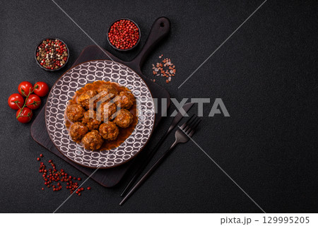 Meat, meatballs in tomato sauce, Italian food, beef or pork with salt . Meatballs with tomatoes 129995205