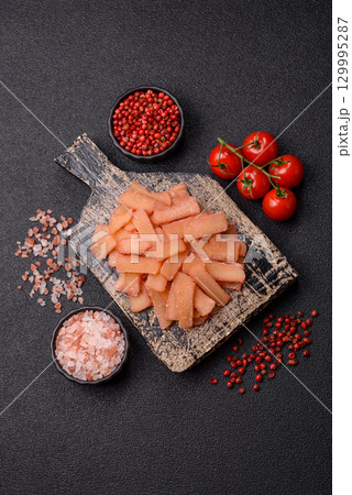 Food, dried squid in shavings or chopped as snacks or jerky. Snack dried squid for beer 129995287