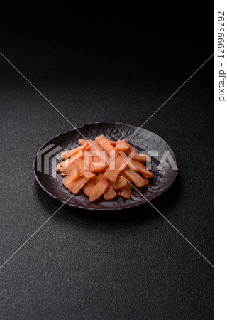 Food, dried squid in shavings or chopped as snacks or jerky. Snack dried squid for beer 129995292