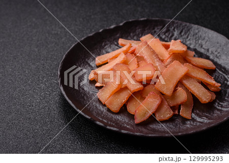 Food, dried squid in shavings or chopped as snacks or jerky. Snack dried squid for beer 129995293