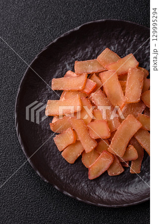 Food, dried squid in shavings or chopped as snacks or jerky. Snack dried squid for beer 129995294