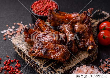 Meat, beef ribs in a marinade grilled with salt and spices. Grilled ribs 129995396