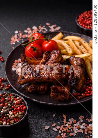 Meat, beef ribs in a marinade grilled with salt and spices. Grilled ribs 129995430