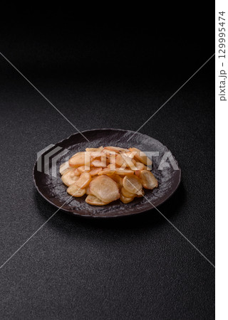 Food, dried squid in shavings or chopped as snacks or jerky. Snack dried squid for beer 129995474