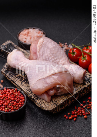 Raw chicken legs, fresh uncooked poultry meat. Chicken or turkey legs 129995483