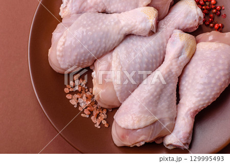 Raw chicken legs, fresh uncooked poultry meat. Chicken or turkey legs 129995493