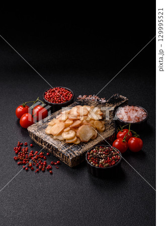 Food, dried squid in shavings or chopped as snacks or jerky. Snack dried squid for beer 129995521