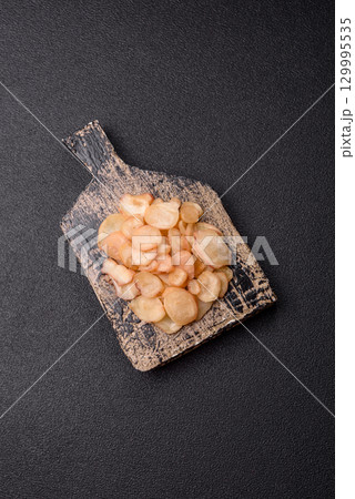 Food, dried squid in shavings or chopped as snacks or jerky. Snack dried squid for beer 129995535