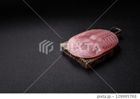 Sliced ham, meat, pork or turkey sausage for sandwiches. Ham slices, food Sliced ham, meat, pork or turkey sausage for sandwiches. Ham slices, food 129995768