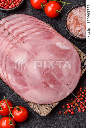 Sliced ham, meat, pork or turkey sausage for sandwiches. Ham slices, food Sliced ham, meat, pork or turkey sausage for sandwiches. Ham slices, food 129995778
