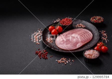 Sliced ham, meat, pork or turkey sausage for sandwiches. Ham slices, food Sliced ham, meat, pork or turkey sausage for sandwiches. Ham slices, food 129995784