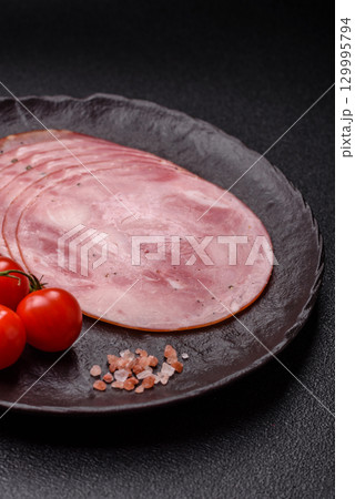 Sliced ham, meat, pork or turkey sausage for sandwiches. Ham slices, food Sliced ham, meat, pork or turkey sausage for sandwiches. Ham slices, food 129995794