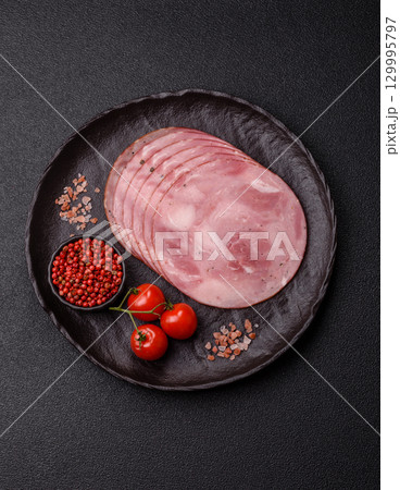 Sliced ham, meat, pork or turkey sausage for sandwiches. Ham slices, food Sliced ham, meat, pork or turkey sausage for sandwiches. Ham slices, food 129995797