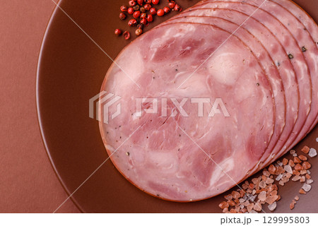 Sliced ham, meat, pork or turkey sausage for sandwiches. Ham slices, food Sliced ham, meat, pork or turkey sausage for sandwiches. Ham slices, food 129995803