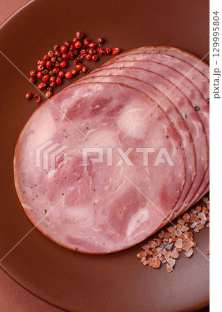 Sliced ham, meat, pork or turkey sausage for sandwiches. Ham slices, food Sliced ham, meat, pork or turkey sausage for sandwiches. Ham slices, food 129995804