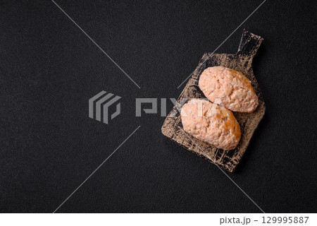 Steamed fish or chicken cutlets or meatballs with salt and spices. Fish cutlets Steamed fish or chicken cutlets or meatballs with salt and spices. Fish cutlets 129995887