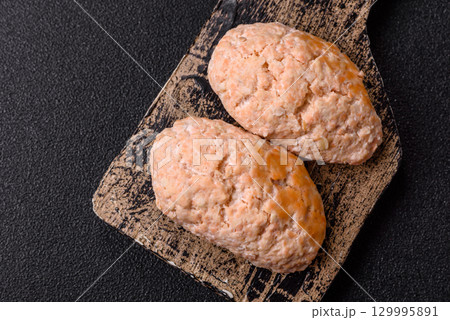 Steamed fish or chicken cutlets or meatballs with salt and spices. Fish cutlets Steamed fish or chicken cutlets or meatballs with salt and spices. Fish cutlets 129995891