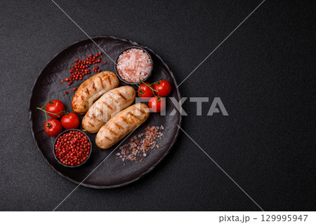 Grilled chicken or beef sausages, a hot meat dish. Barbecued sausages Grilled chicken or beef sausages, a hot meat dish. Barbecued sausages 129995947