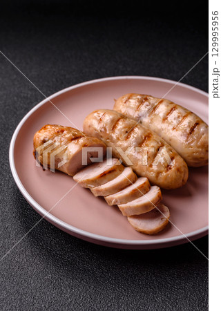 Grilled chicken or beef sausages, a hot meat dish. Barbecued sausages Grilled chicken or beef sausages, a hot meat dish. Barbecued sausages 129995956