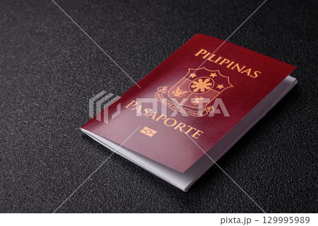 Philippines passport for travelling, flying and doing business. Philippines document 129995989