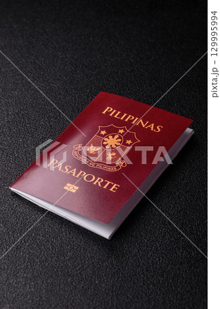 Philippines passport for travelling, flying and doing business. Philippines document Philippines passport for travelling, flying and doing business. Philippines document 129995994