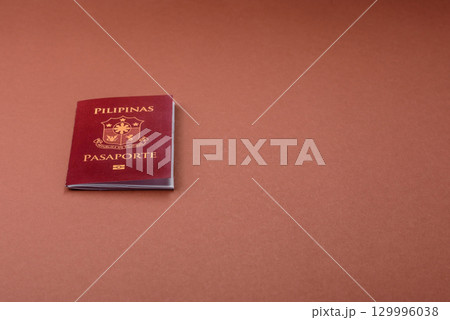 Philippines passport for travelling, flying and doing business. Philippines document 129996038