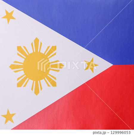 Philippines flag in red, white and blue colors as a symbol of independence. Flag of Philippines Philippines flag in red, white and blue colors as a symbol of independence. Flag of Philippines 129996053