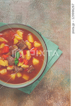 meat goulash, with potatoes and carrots, sweet pepper, traditional Hungarian soup, homemade, no people, 129996267