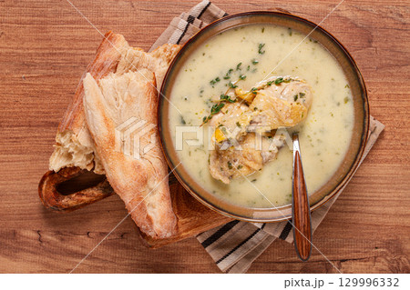 Chikhirtma chicken soup, Georgian dish, with lavash, top view, no people, Chikhirtma chicken soup, Georgian dish, with lavash, top view, no people, 129996332