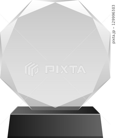 A multifaceted clear award sits on a square, dark grey base on a black background. Minimalist. 129996383