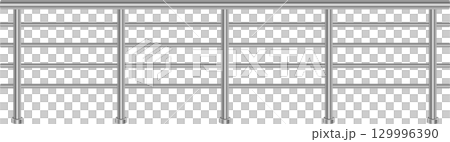 A silver metal railing with horizontal bars runs across the black background in this image. A silver metal railing with horizontal bars runs across the black background in this image. 129996390