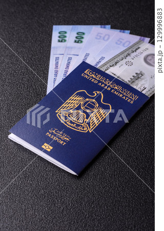 OAE passport for travelling, flying and doing business. Arabic document, id OAE passport for travelling, flying and doing business. Arabic document, id 129996883