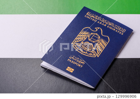 OAE passport for travelling, flying and doing business. Arabic document, id 129996906