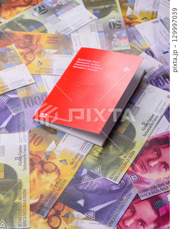 Swiss passport for travelling, flying and doing business. Switzerland document Swiss passport for travelling, flying and doing business. Switzerland document 129997039