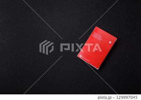 Swiss passport for travelling, flying and doing business. Switzerland document Swiss passport for travelling, flying and doing business. Switzerland document 129997045